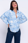 Cornflower blue shirt with cream motif