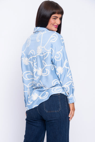 Cornflower blue shirt with cream motif